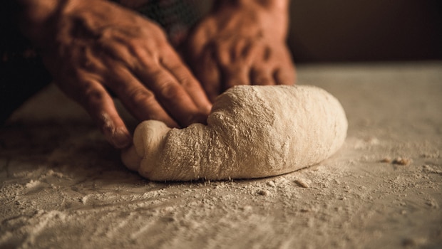 Knead the dough using a combination of maida and sooji.