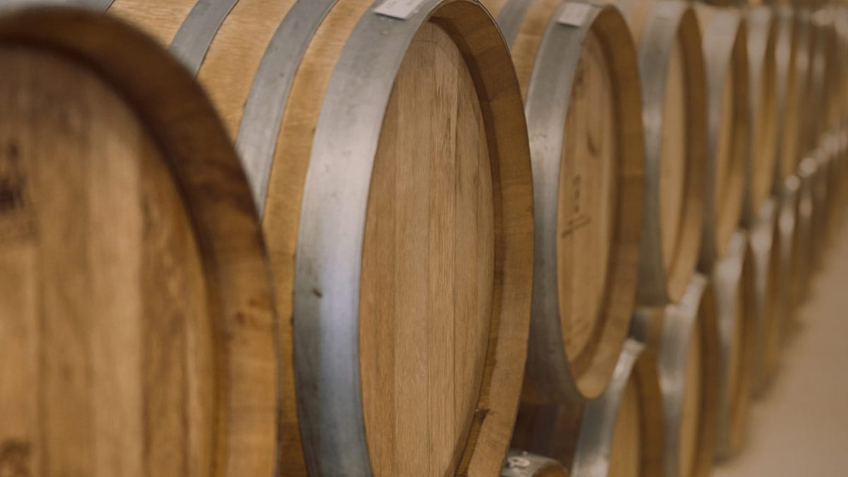 Bourbon whisky is aged in an oak barrel.