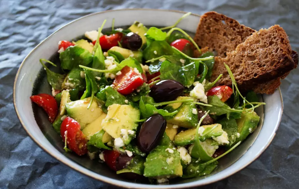 Quinoa and Black Bean Salad  Combine cooked quinoa with black beans, corn kernels, diced bell peppers, and chopped cilantro. Dress with a lime vinaigrette made with olive oil, lime juice, cumin, and a touch of honey. This salad is protein-rich and bursting with Southwestern flair.Source: Pexels