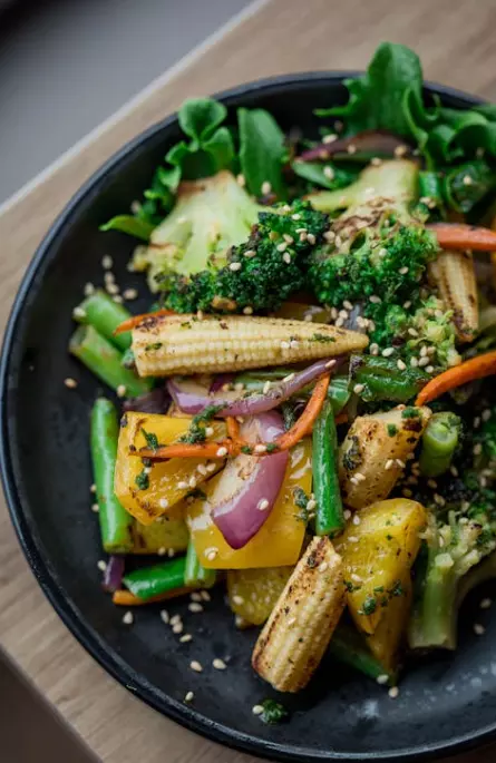 Quinoa and Black Bean Salad Combine quinoa, black beans, tomatoes, cucumber, and cilantro in a bowl. Drizzle with lime juice and olive oil, season with salt and pepper, and toss gently. Top with avocado slices for extra creaminess and serve.