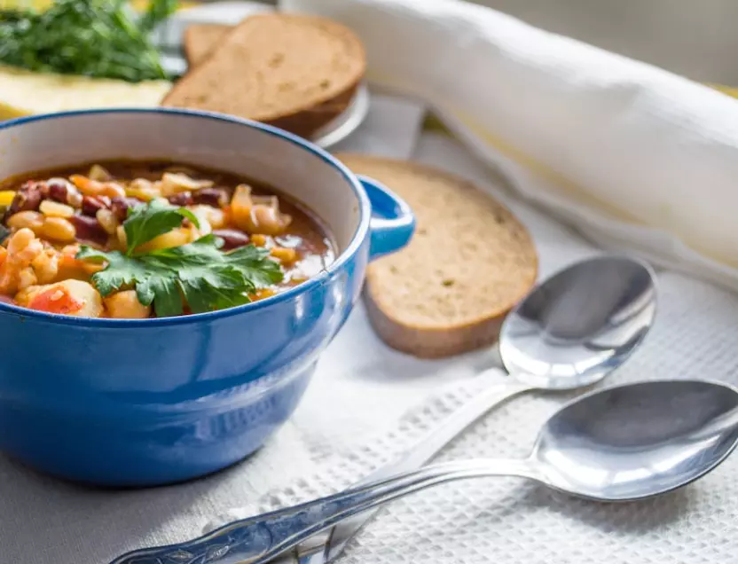 Lentil and Vegetable Soup Saute chopped carrots, celery, and onion in olive oil until softened. Add vegetable broth, diced tomatoes, cooked lentils, bay leaves, and fresh thyme. Simmer until flavours meld together. Season with salt and pepper, then serve hot with a slice of crusty bread.