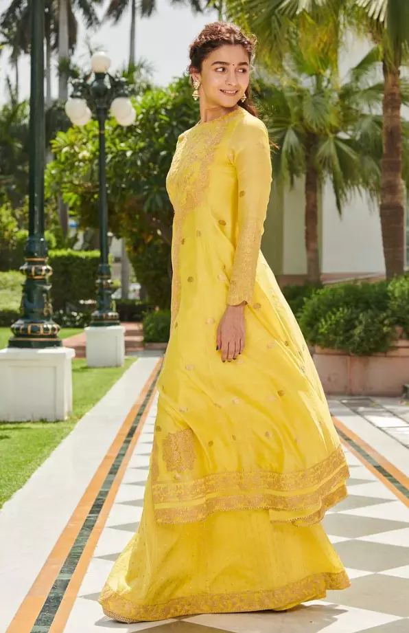 Alia Bhatts traditional sharara looks Opt for shararas with voluminous ghararas and pair them with short kurtas or peplum tops. Rich fabrics like silk or brocade with heavy dupattas complete the look.