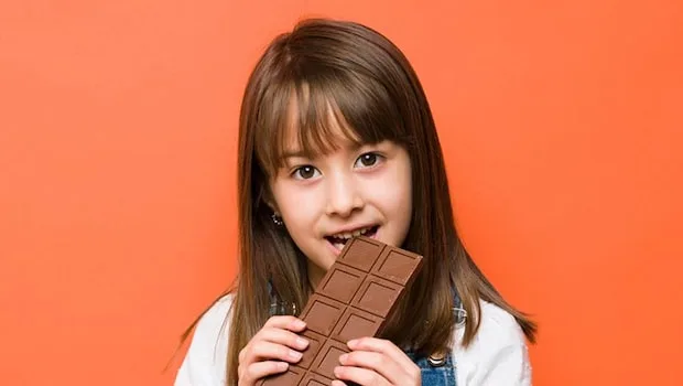 Girl Enjoying Chocolate