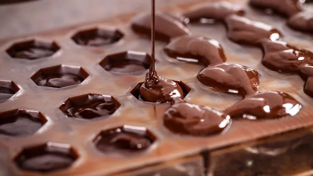 Chocolate Being Poured Into Moulds