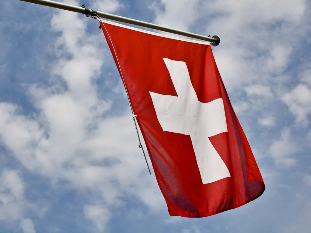 Swiss central bank cuts rate in first among developed economies