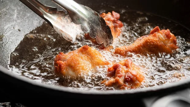 Deep frying requires a large amount of oil to cook the food.